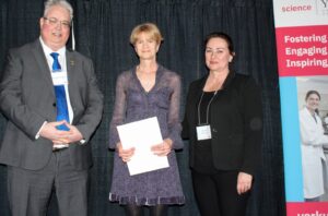 Wendy Taylor holding certificate, in between Mike Scheid and Jennifer Steeves